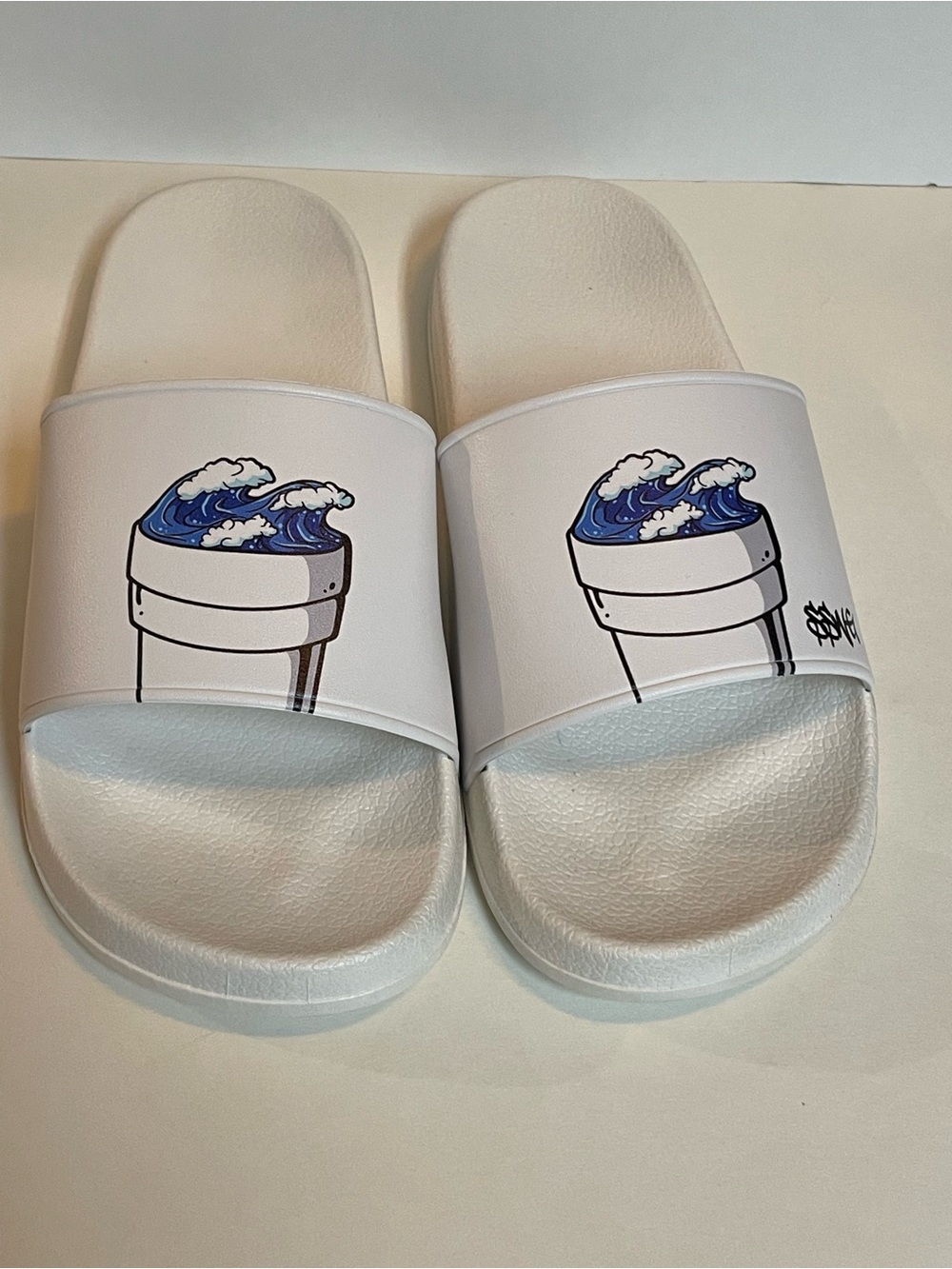 White Slide Sandals with Blue Wave Graphic